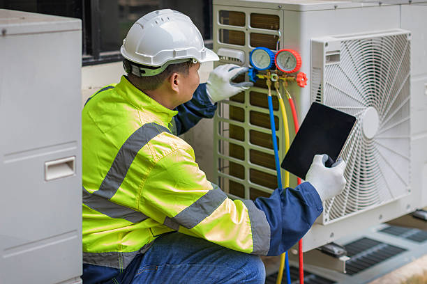 Professional Hvac Maintenance technician working in Manasota, FL